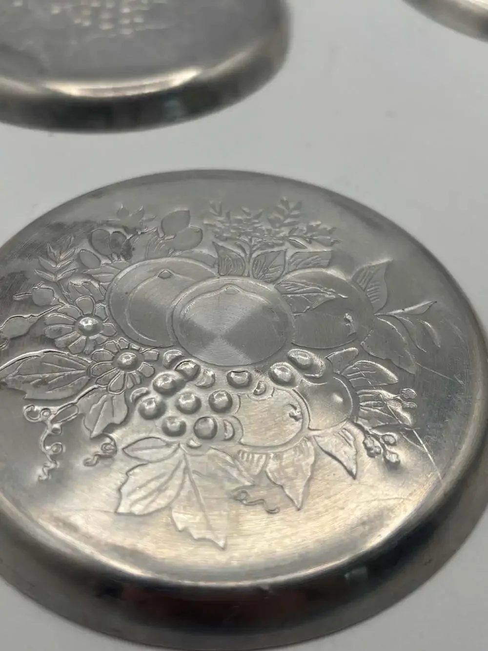 Set of 4 Vintage Embossed Aluminum Fruit Motif Coasters